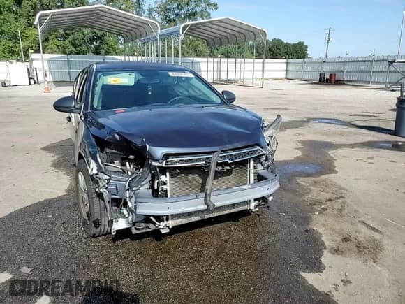 2014 Chevrolet Cruze LS z VIN 1G1PA5SH2E7330855, wystawiony jako Copart lot #84036265 z przebiegiem Nie podano mil oraz Szkoda całkowita • Salvage title. Historia ofert i sprzedaży dostępna na DreamBid. Obrazek 13.