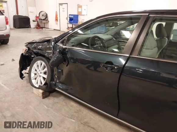2013 Toyota Camry XLE with VIN 4T1BD1FK5DU097069, listed as a IAAI auction lot 43052279 with 90,257 mi miles and . Bid and sale history available at DreamBid. Image 17.