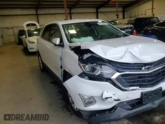 2020 Chevrolet Equinox LT с VIN 2GNAXTEV1L6195907, выставлен на аукционе Copart как лот 69734075 с пробегом 84 092 миль миль и Списание • Salvage title. История ставок и продаж доступна на DreamBid. Изображение 14.