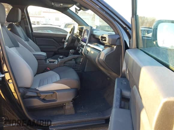 2024 Toyota Tacoma SR5 with VIN 3TYLB5JN3RT032583, listed as a IAAI auction lot 41404527 with 7,130 mi miles and . Bid and sale history available at DreamBid. Image 5.