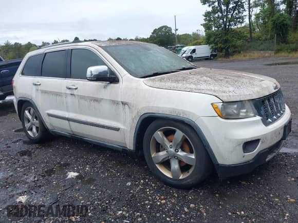 2011 Jeep Grand Cherokee Overland with VIN 1J4RR6GG7BC684446, listed as a IAAI auction lot 43403449 with 169,586 mi miles and . Bid and sale history available at DreamBid. Image 13.