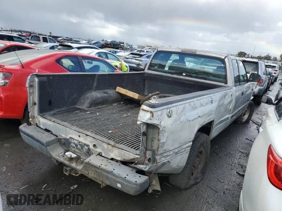 1999 Dodge 2500 with VIN 1B7KC2364XJ541343, listed as a Copart auction lot 49645834 with 129,901 mi miles and Salvage title. Bid and sale history available at DreamBid. Image 3.