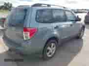 2011 Subaru Forester X with VIN JF2SHBBC8BH724058, listed as a IAAI auction lot 43547335 with 183,923 mi miles and . Bid and sale history available at DreamBid. Image 4.