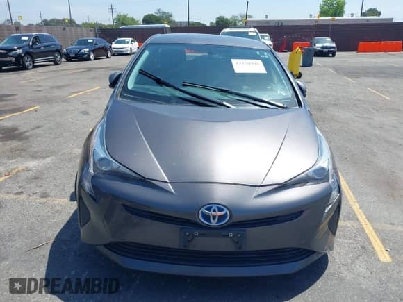 2016 Toyota Prius Two with VIN JTDKBRFU3G3511034, listed as a IAAI auction lot 42330990 with 175,117 mi miles and . Bid and sale history available at DreamBid. Image 11.