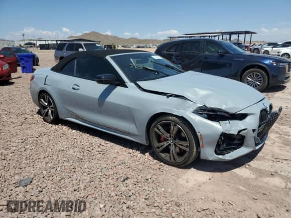 2022 BMW 4 Series 430i with VIN WBA23AT0XNCH93797, listed as a Copart auction lot 67658555 with 52,210 mi miles and Salvage title. Bid and sale history available at DreamBid. Image 4.