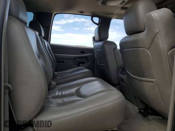 2004 Chevrolet Suburban Z71 z VIN 3GNFK16Z74G330811, wystawiony jako Copart lot #68074295 z przebiegiem Nie podano mil oraz Szkoda całkowita • Salvage title. Historia ofert i sprzedaży dostępna na DreamBid. Obrazek 10.