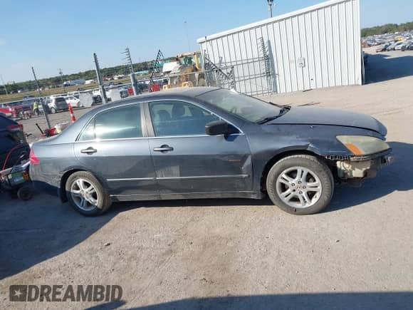 2006 Honda Accord EX-L with VIN 1HGCM56826A083334, listed as a IAAI auction lot 43333070 with 244,300 mi miles and . Bid and sale history available at DreamBid. Image 13.