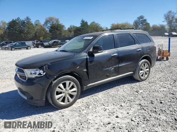 2013 Dodge Durango Crew with VIN 1C4RDJDG6DC695419, listed as a Copart auction lot 87022395 with 219,976 mi miles and Salvage title. Bid and sale history available at DreamBid. Image 1.