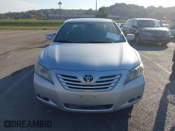 2007 Toyota Camry LE z VIN 4T1BK46K07U042492, wystawiony jako IAAI lot #43453669 z przebiegiem 197 198 mil mil oraz . Historia ofert i sprzedaży dostępna na DreamBid. Obrazek 6.