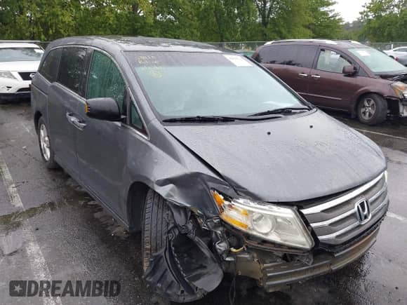 2011 Honda Odyssey Touring z VIN 5FNRL5H90BB035530, wystawiony jako IAAI lot #43029726 z przebiegiem 115 195 mil mil oraz . Historia ofert i sprzedaży dostępna na DreamBid. Obrazek 1.