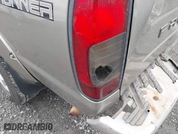 2001 Nissan Frontier SE Desert Runner z VIN 1N6ED26T91C346200, wystawiony jako IAAI lot #41914616 z przebiegiem 236 612 mil mil oraz . Historia ofert i sprzedaży dostępna na DreamBid. Obrazek 13.