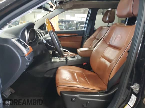 2012 Jeep Grand Cherokee Overland z VIN 1C4RJFCG5CC214050, wystawiony jako Copart lot #66410885 z przebiegiem 137 195 mil mil oraz Szkoda całkowita • Salvage title. Historia ofert i sprzedaży dostępna na DreamBid. Obrazek 7.