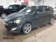 2014 Chevrolet Sonic RS with VIN 1G1JG6SB5E4210541, listed as a IAAI auction lot 43242084 with 146,454 mi miles and . Bid and sale history available at DreamBid. Image 2.