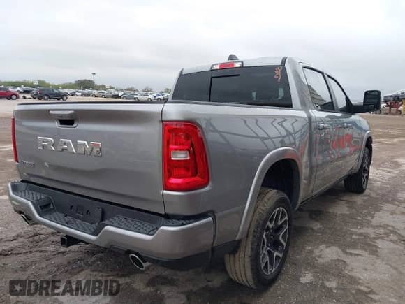 2025 Ram 1500 with VIN 1C6RREJP5SN601648, listed as a IAAI auction lot 41022685 with 2,383 mi miles and . Bid and sale history available at DreamBid. Image 4.