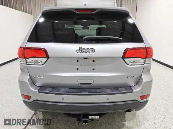 2020 Jeep Grand Cherokee Laredo E z VIN 1C4RJFAGXLC153684, wystawiony jako Copart lot #86517945 z przebiegiem 139 511 mil mil oraz Czysty tytuł • Clean title. Historia ofert i sprzedaży dostępna na DreamBid. Obrazek 6.