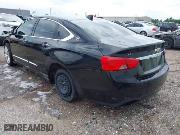 2020 Chevrolet Impala Premier with VIN 2G1105S39L9106197, listed as a IAAI auction lot 42705800 with 134,013 mi miles and . Bid and sale history available at DreamBid. Image 3.