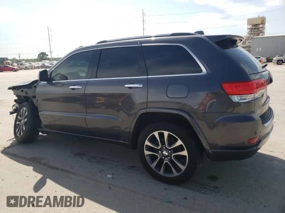 2017 Jeep Grand Cherokee Overland with VIN 1C4RJECG4HC903367, listed as a Copart auction lot 61584705 with 91,464 mi miles and Salvage title. Bid and sale history available at DreamBid. Image 2.