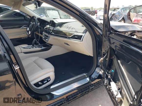 2018 BMW 7 Series 750i with VIN WBA7F0C57JGM23748, listed as a IAAI auction lot 42374137 with 111,120 mi miles and . Bid and sale history available at DreamBid. Image 5.