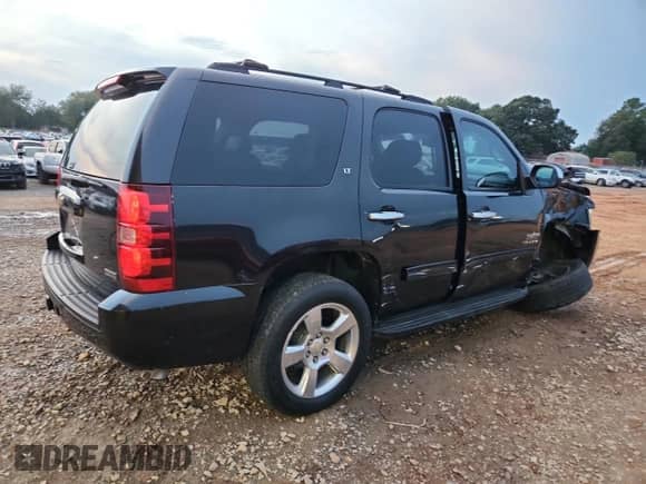 2010 Chevrolet Tahoe LT with VIN 1GNUCBE04AR137136, listed as a Copart auction lot 83794435 with 202,211 mi miles and Salvage title. Bid and sale history available at DreamBid. Image 3.