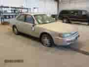 1996 Toyota Camry LE z VIN JT2BF12K2T0179991, wystawiony jako IAAI lot #43512900 z przebiegiem 301 917 mil mil oraz . Historia ofert i sprzedaży dostępna na DreamBid. Obrazek 1.