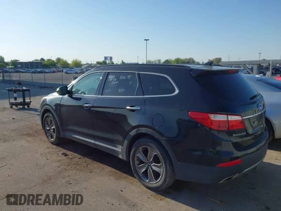 2014 Hyundai Santa Fe GLS with VIN KM8SMDHF2EU070690, listed as a IAAI auction lot 42167930 with 203,251 mi miles and . Bid and sale history available at DreamBid. Image 3.