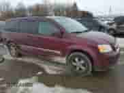 2009 Dodge Caravan with VIN 2D8HN44X09R698892, listed as a Copart auction lot 46064705 with 275,299 mi miles and Clean title. Bid and sale history available at DreamBid. Image 4.