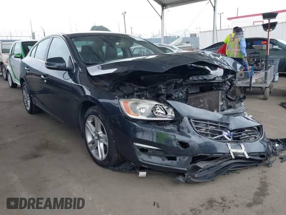 2015 Volvo S60 T5 Drive-E Premier with VIN YV126MFB0F2301169, listed as a IAAI auction lot 42500241 with 71,732 mi miles and . Bid and sale history available at DreamBid. Image 1.