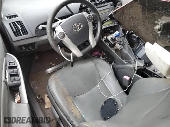 2011 Toyota Prius I z VIN JTDKN3DUXB5246746, wystawiony jako Copart lot #66829535 z przebiegiem Nie podano mil oraz Szkoda całkowita • Salvage title. Historia ofert i sprzedaży dostępna na DreamBid. Obrazek 8.