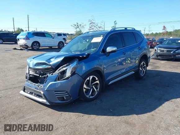 2022 Subaru Forester Touring z VIN JF2SKARC3NH432677, wystawiony jako IAAI lot #43468143 z przebiegiem 50 819 mil mil oraz . Historia ofert i sprzedaży dostępna na DreamBid. Obrazek 18.