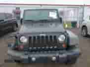 2012 Jeep Wrangler Sport with VIN 1C4AJWAG6CL179020, listed as a IAAI auction lot 43438220 with 153,792 mi miles and . Bid and sale history available at DreamBid. Image 12.