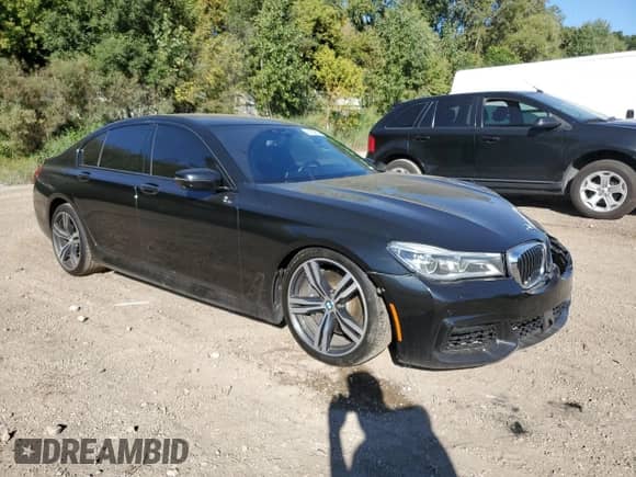 2016 BMW 7 Series 750i xDrive with VIN WBA7B0C57GG526950, listed as a Copart auction lot 81829615 with 84,030 mi miles and Clean title. Bid and sale history available at DreamBid. Image 4.