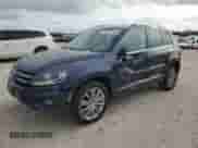 2013 Volkswagen Tiguan SE z VIN WVGAV3AX9DW056696, wystawiony jako Copart lot #54721695 z przebiegiem 108 656 mil mil oraz Szkoda całkowita • Salvage title. Historia ofert i sprzedaży dostępna na DreamBid. Obrazek 1.