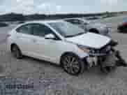 2021 Hyundai Accent Limited z VIN 3KPC34A60ME145292, wystawiony jako Copart lot #63570065 z przebiegiem 76 712 mil mil oraz Szkoda całkowita • Salvage title. Historia ofert i sprzedaży dostępna na DreamBid. Obrazek 4.