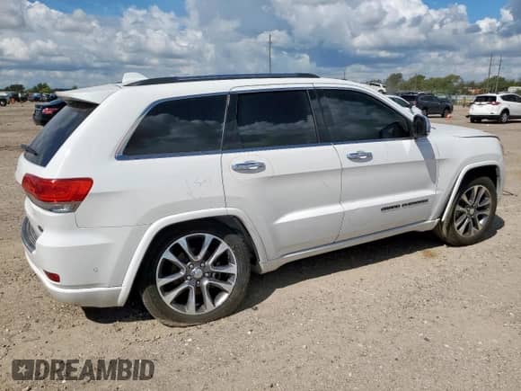 2017 Jeep Grand Cherokee Overland with VIN 1C4RJECG8HC965161, listed as a Copart auction lot 82068045 with 99,654 mi miles and Salvage title. Bid and sale history available at DreamBid. Image 3.