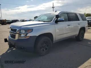 2018 Chevrolet Tahoe Commercial with VIN 1GNSKDEC2JR296611, listed as a Copart auction lot 70801885 with 80,872 mi miles and Salvage title. Bid and sale history available at DreamBid. Image 1.