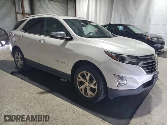 2018 Chevrolet Equinox Premier z VIN 2GNAXVEV6J6164385, wystawiony jako Copart lot #80213225 z przebiegiem 82 081 mil mil oraz Czysty tytuł • Clean title. Historia ofert i sprzedaży dostępna na DreamBid. Obrazek 4.