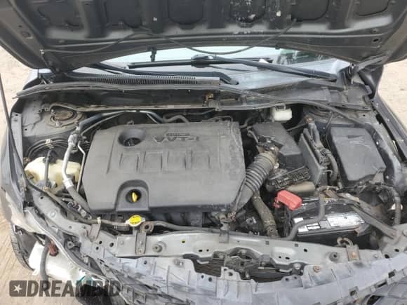 2011 Toyota Corolla L z VIN 2T1BU4EE3BC719941, wystawiony jako Copart lot #69679225 z przebiegiem 108 818 mil mil oraz Szkoda całkowita • Salvage title. Historia ofert i sprzedaży dostępna na DreamBid. Obrazek 11.