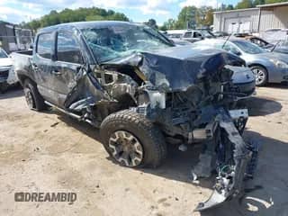 2021 Toyota Tacoma TRD Off Road with VIN 3TMCZ5AN7MM392715, listed as a IAAI auction lot 43099225 with 55,000 mi miles and . Bid and sale history available at DreamBid. Image 1.