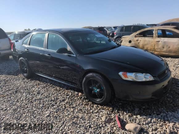 2013 Chevrolet Impala Police with VIN 2G1WD5E3XD1162414, listed as a Copart auction lot 53910565 with 146,081 mi miles and Salvage title. Bid and sale history available at DreamBid. Image 4.