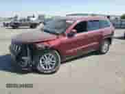 2018 Jeep Grand Cherokee Altitude with VIN 1C4RJEAGXJC513169, listed as a Copart auction lot 71512345 with 70,013 mi miles and Salvage title. Bid and sale history available at DreamBid. Image 1.