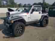 2003 Jeep Wrangler Rubicon с VIN 1J4FA69S53P375189, выставлен на аукционе Copart как лот 54292035 с пробегом 55 863 миль миль и Списание • Salvage title. История ставок и продаж доступна на DreamBid. Изображение 1.
