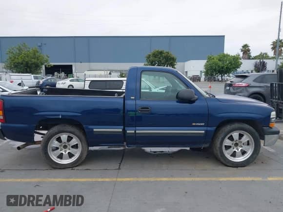 2000 Chevrolet Silverado 1500 LS with VIN 1GCEC14W3YZ104233, listed as a IAAI auction lot 42824914 with Not provided miles and . Bid and sale history available at DreamBid. Image 14.