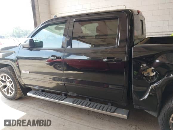 2017 GMC Sierra 1500 SLT with VIN 3GTU2NEC9HG158663, listed as a IAAI auction lot 42691474 with 159,405 mi miles and . Bid and sale history available at DreamBid. Image 14.