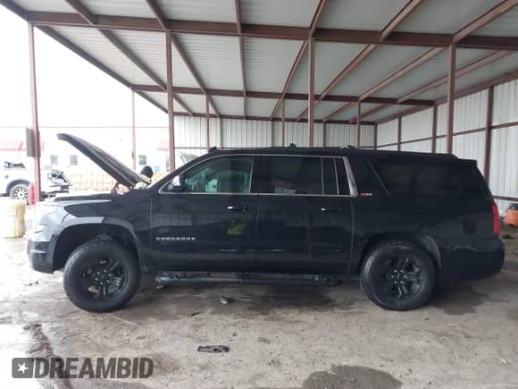 2020 Chevrolet Suburban LT z VIN 1GNSKHKC4LR304237, wystawiony jako IAAI lot #41179977 z przebiegiem 94 302 mil mil oraz . Historia ofert i sprzedaży dostępna na DreamBid. Obrazek 13.