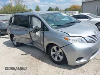2015 Toyota Sienna LE with VIN 5TDKK3DC4FS575233, listed as a IAAI auction lot 43251515 with 161,608 mi miles and . Bid and sale history available at DreamBid. Image 1.