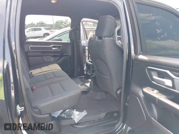 2023 Ram 1500 Big Horn with VIN 1C6SRFMT5PN541779, listed as a IAAI auction lot 42664332 with 21,067 mi miles and . Bid and sale history available at DreamBid. Image 8.