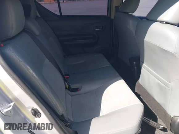 2015 Toyota Prius One z VIN JTDKDTB32F1099834, wystawiony jako IAAI lot #42310162 z przebiegiem 208 498 mil mil oraz . Historia ofert i sprzedaży dostępna na DreamBid. Obrazek 8.