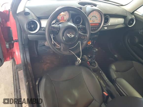 2013 MINI Hardtop with VIN WMWSU3C59DT687082, listed as a Copart auction lot 61967995 with 107,708 mi miles and Clean title. Bid and sale history available at DreamBid. Image 8.