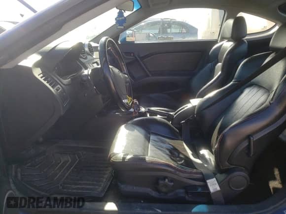 2006 Hyundai Tiburon SE с VIN KMHHN65D06U230928, выставлен на аукционе Copart как лот 72745854 с пробегом 246 837 миль миль и Чистый • Clean title. История ставок и продаж доступна на DreamBid. Изображение 7.