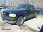 2003 Ford F-150 XL with VIN 1FTRX17293NB00122, listed as a IAAI auction lot 41694760 with 222,241 mi miles and . Bid and sale history available at DreamBid. Image 2.